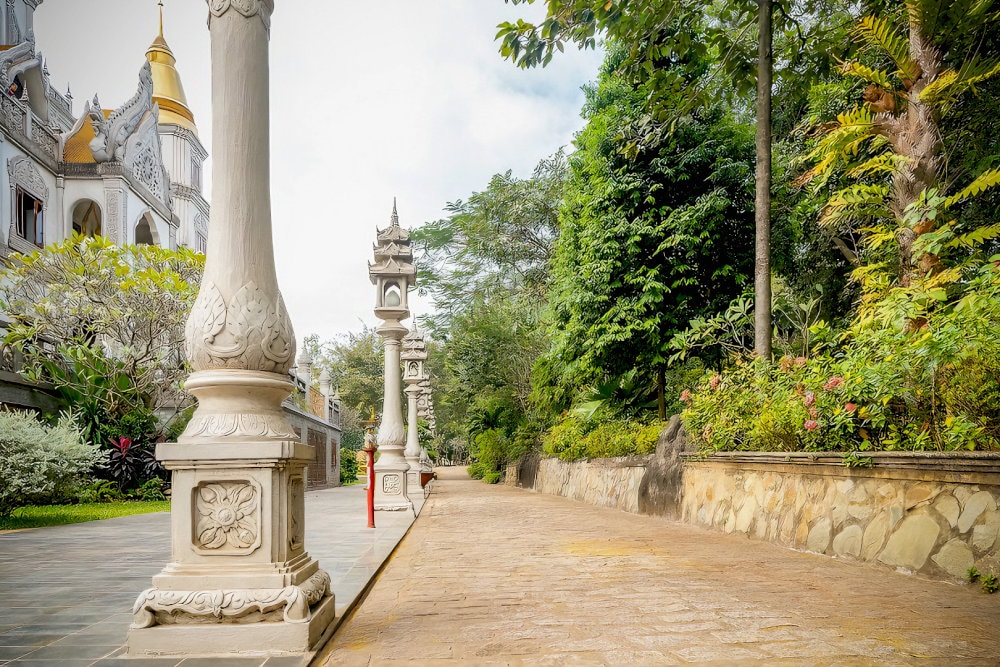 Intricate carved floral patterns express the characteristics of traditional Vietnamese architecture